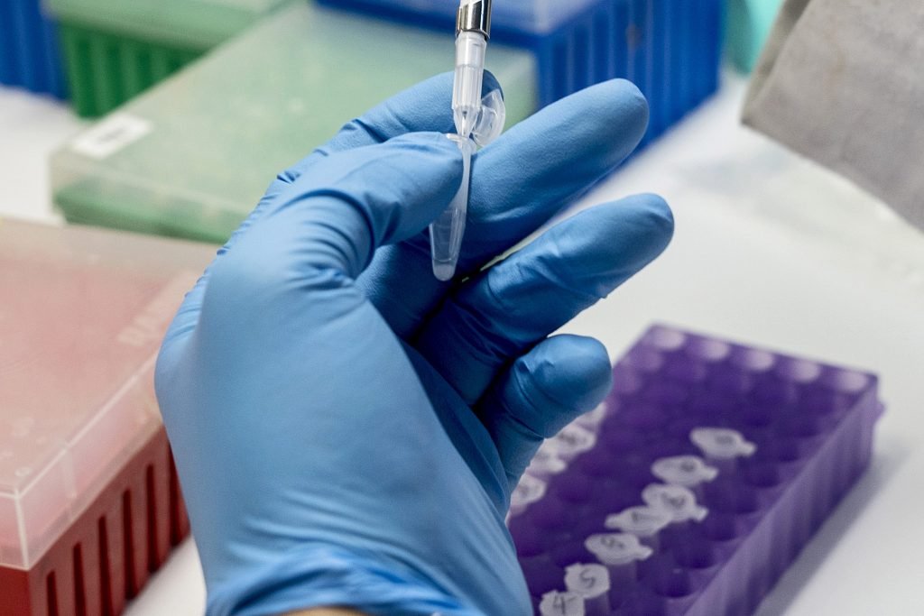 A technician extracts DNA from sludge samples in a research laboratory at the Hong Kong Science Park in Hong Kong, China, on Monday, Dec. 11, 2017. TAL Apparel Ltd., which has factories in mainland China and Southeast Asia, has teamed up with City University to identify bacteria that can clean up more efficiently the vast quantities of waste water the textile industry produces. Photographer: Anthony Kwan/Bloomberg